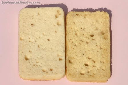 Two rectangular slices of white cake side by side, one lighter and one more golden in color